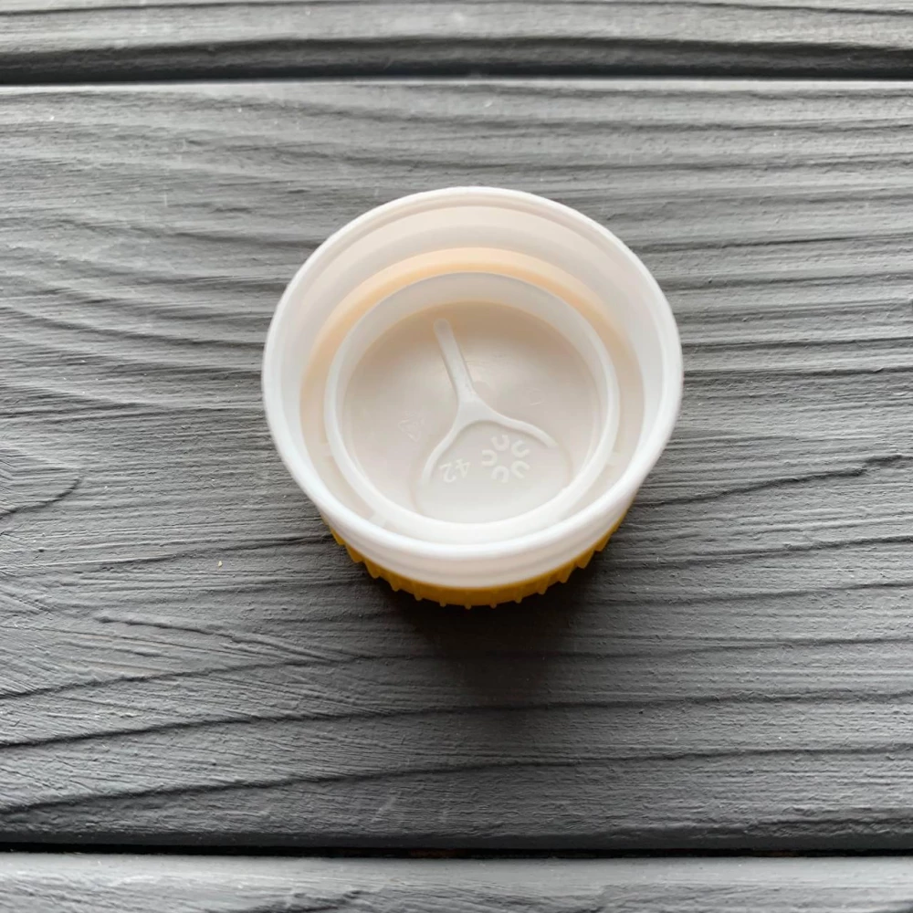 Кришка PET для олії 29мм. жовта (з клапаном)