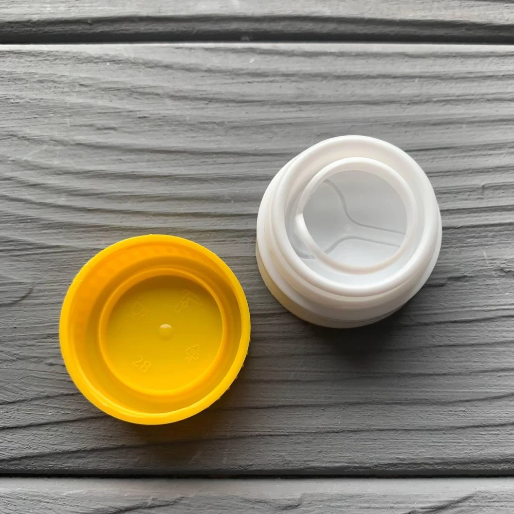 Кришка PET для олії 29мм. жовта (з клапаном)